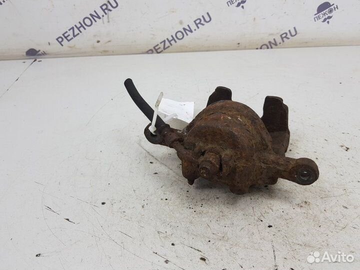 Суппорт тормозной передний правый Kia Rio