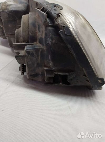 Фара передняя левая Mazda Capella