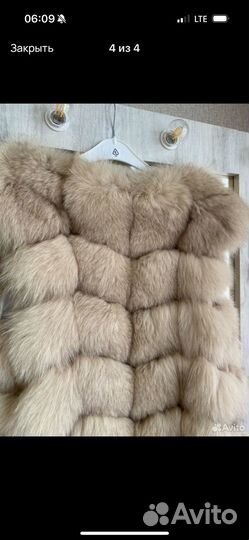Меховая жилетка