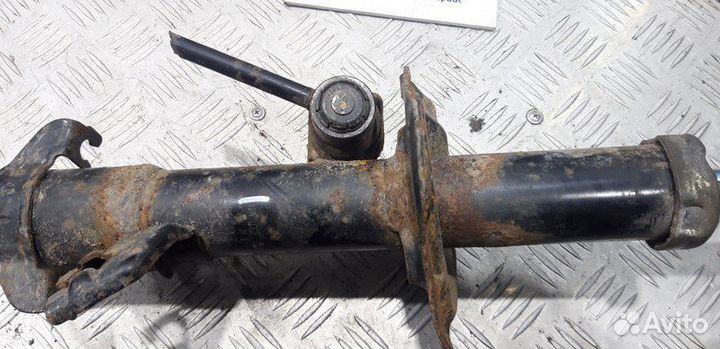 Амортизатор передний левый ориг. Nissan Tiida C11