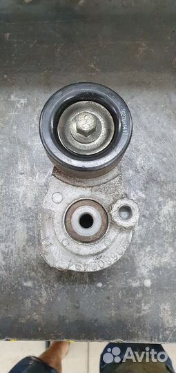 Натяжитель ремня генератора шевролет