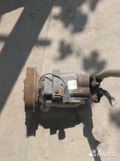 Компрессор кондиционера nissan March K12