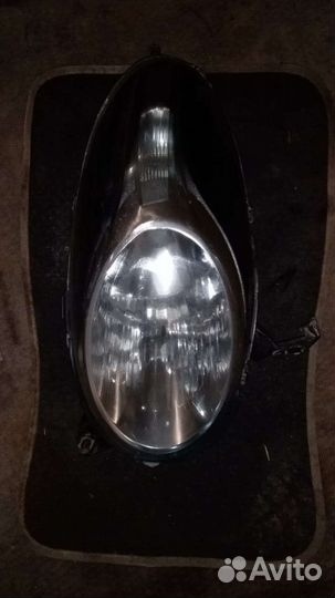 Фара передняя правая на Nissan Mikra k12