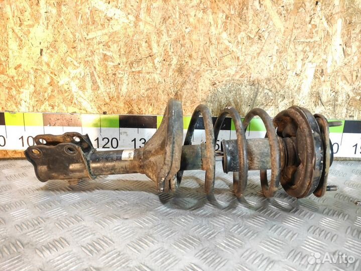 Амортизатор передний левый Mitsubishi Lancer 9