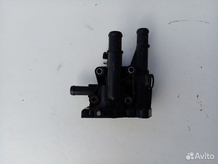 Корпус термостата Opel Astra H