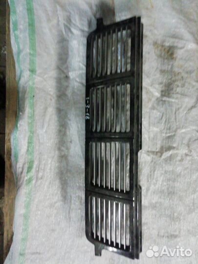 Решетка радиатора передняя Nissan Cube