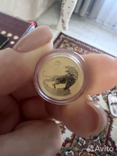 Золотая монета год тигра 1/10 унции