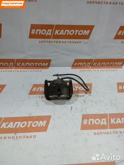 Суппорт тормозной передний левый Nissan X-Trail