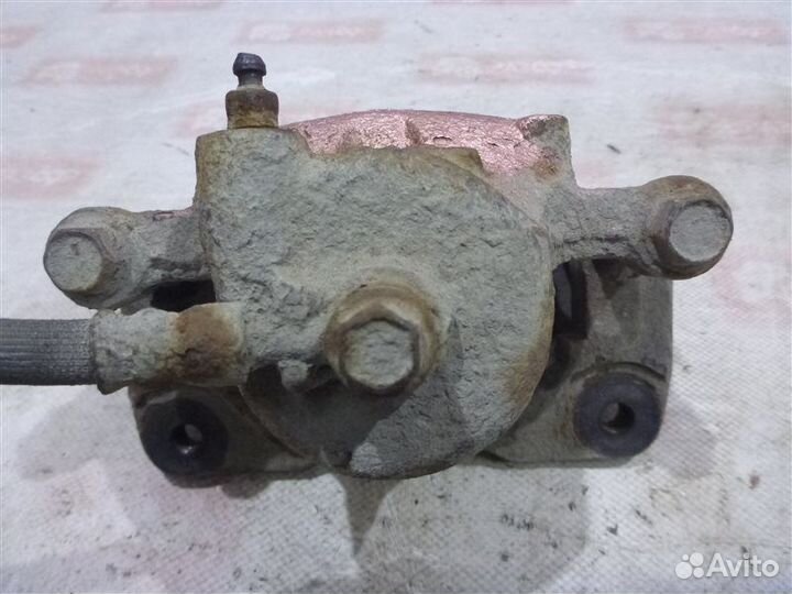 Суппорт передний левый Nissan Almera N15 GA14 1997