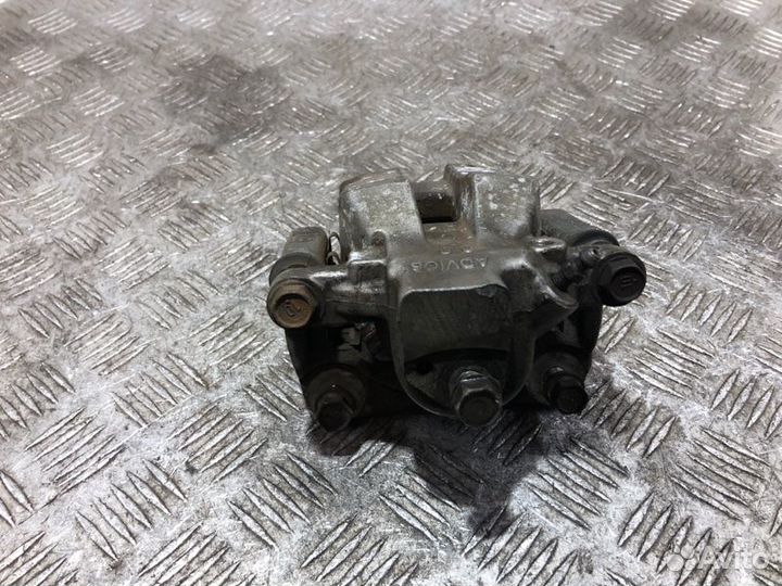 Суппорт тормозной задний левый Toyota Camry V40