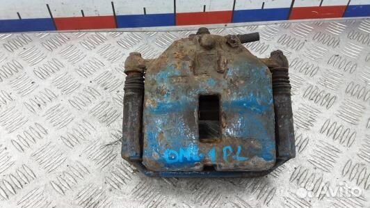 Суппорт тормозной передний левый nissan almera tin