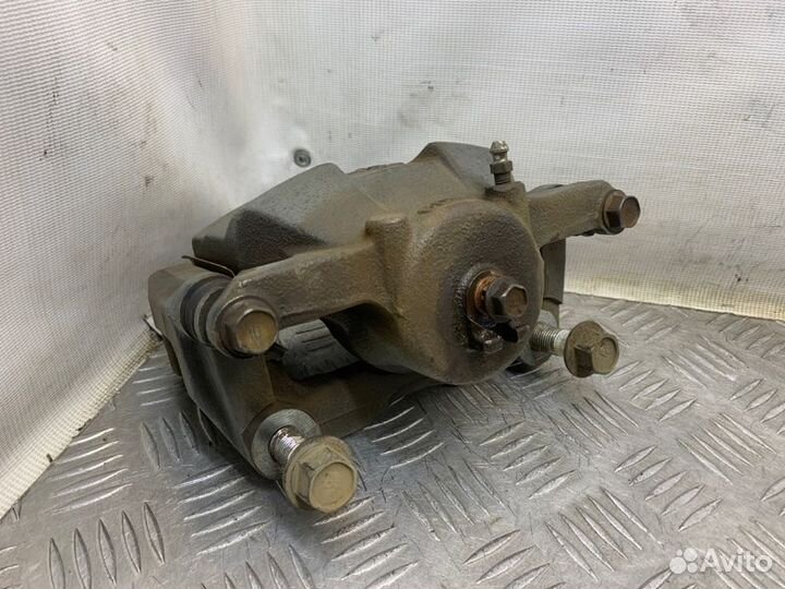 Суппорт тормозной передний правый Nissan X-Trail