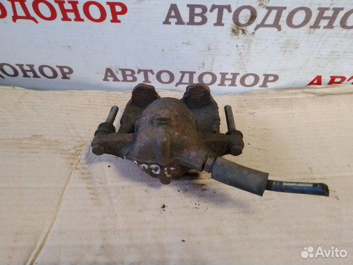 Суппорт тормозной передний левый Renault Laguna