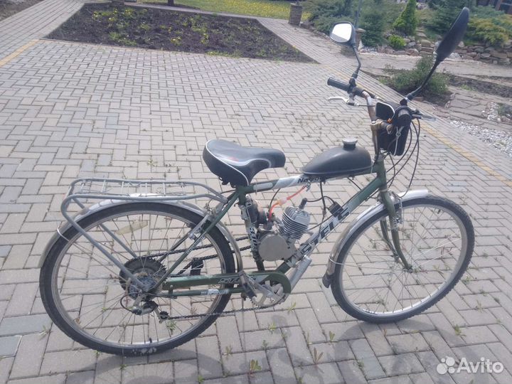 Велосипед stels с мотором 80кубов 2т (торг)