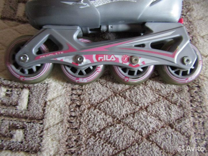 Роликовые коньки