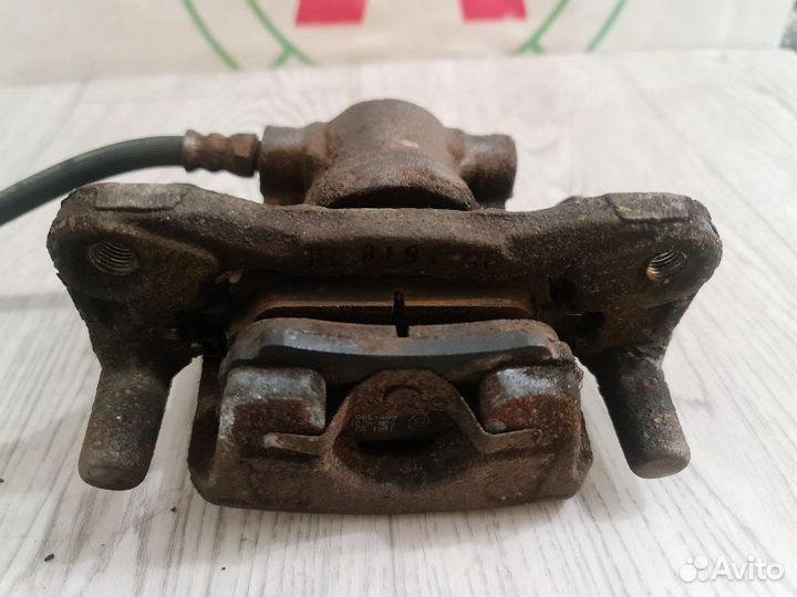 Суппорт задний правый Mitsubishi Lancer 10 CX3A