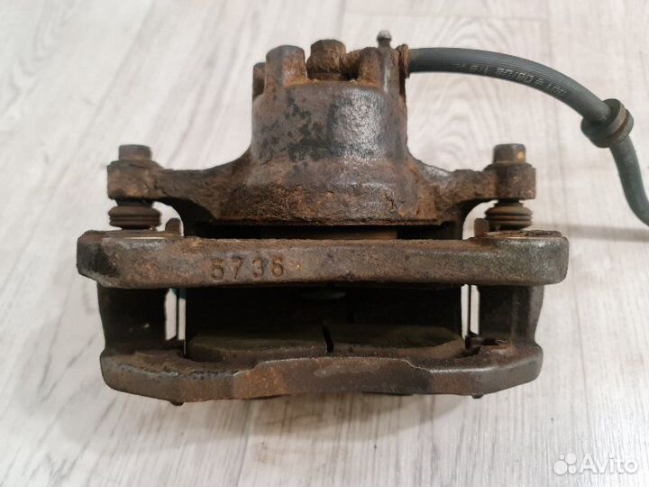 Суппорт передний левый Mitsubishi Lancer 10 CX3A