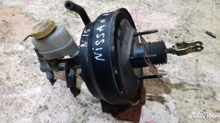 Nissan Almera N15 Вакуумник