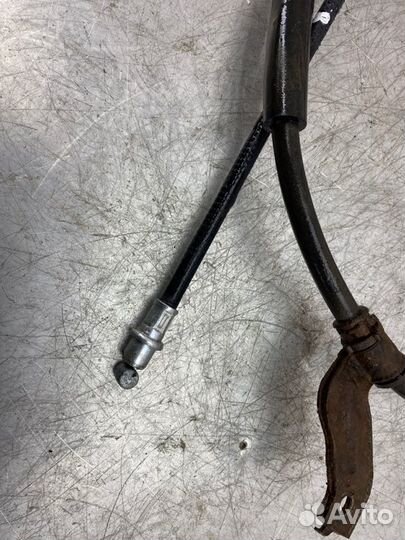 Трос стояночного тормоза левый Hyundai Sonata Nf