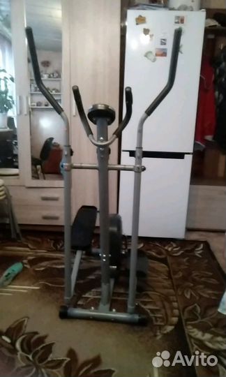 Эллиптический тренажер с инерционным весом маховик