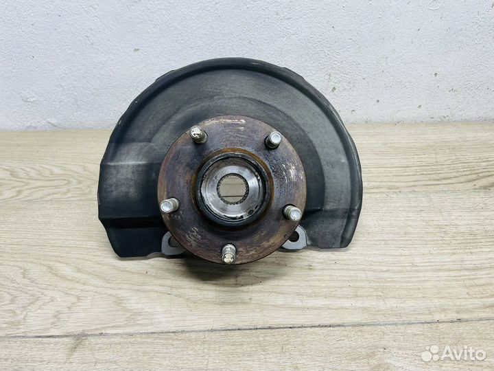 Кулак правый передний Mitsubishi Lancer 10