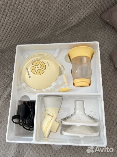 Молокоотсос medela swing flex электрический