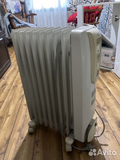 Масляный обогреватель delonghi