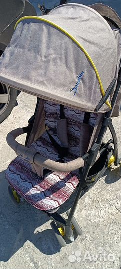 Прогулочная коляска трость
