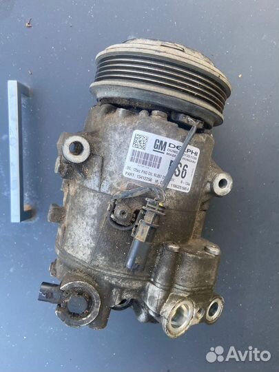 Компрессор кондиционера Опель астра j