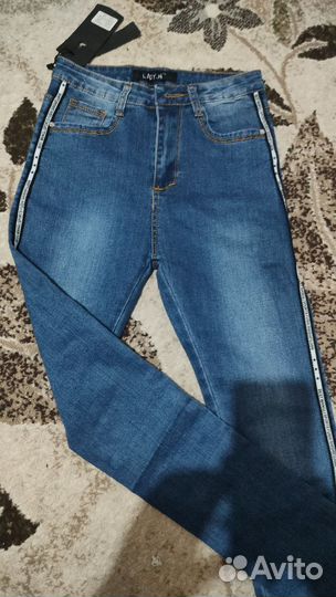 Джинсы новые