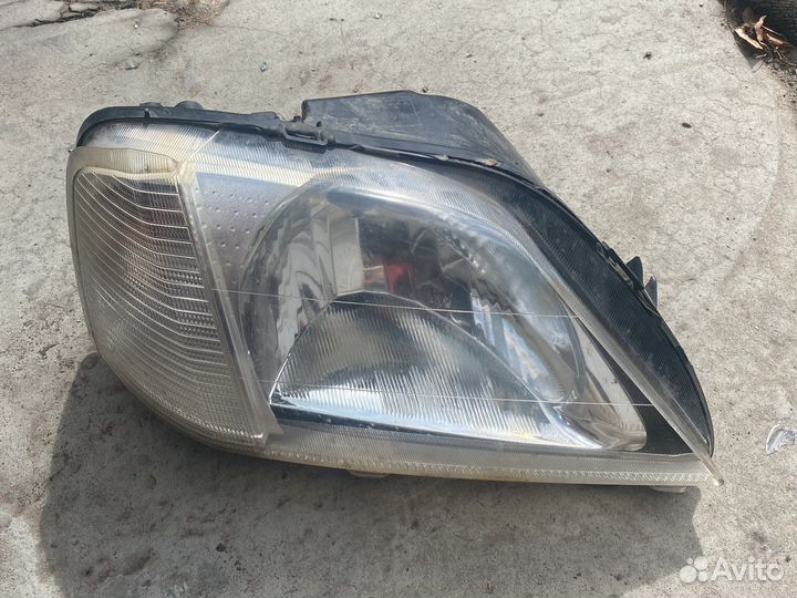 Логан 1 фаза правая фара
