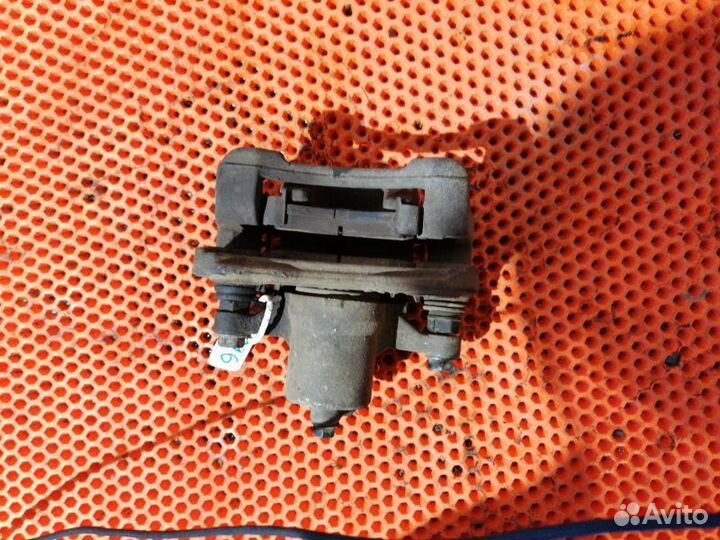 Суппорт тормозной задний правый Kia Sportage