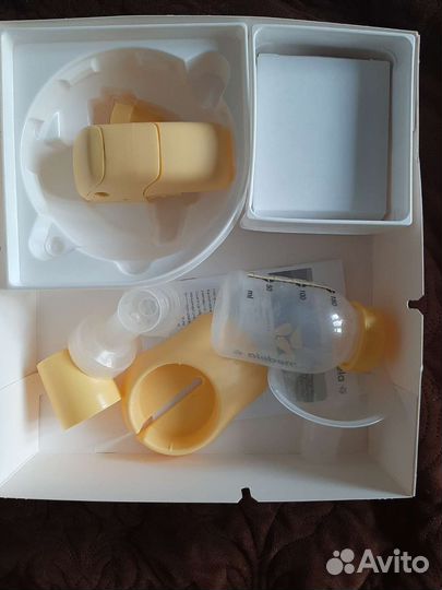 Молокоотсос medela электрический