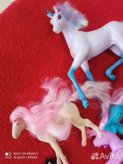 Коллекция игрушек лошадок