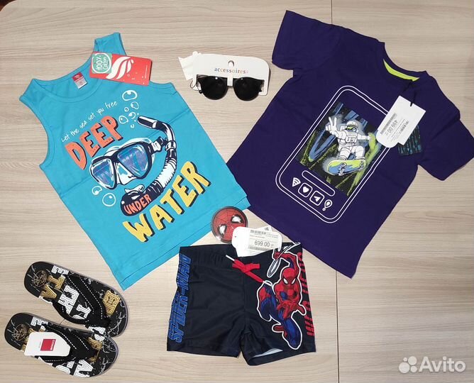 Пакет новой одежды для мальчика р.110
