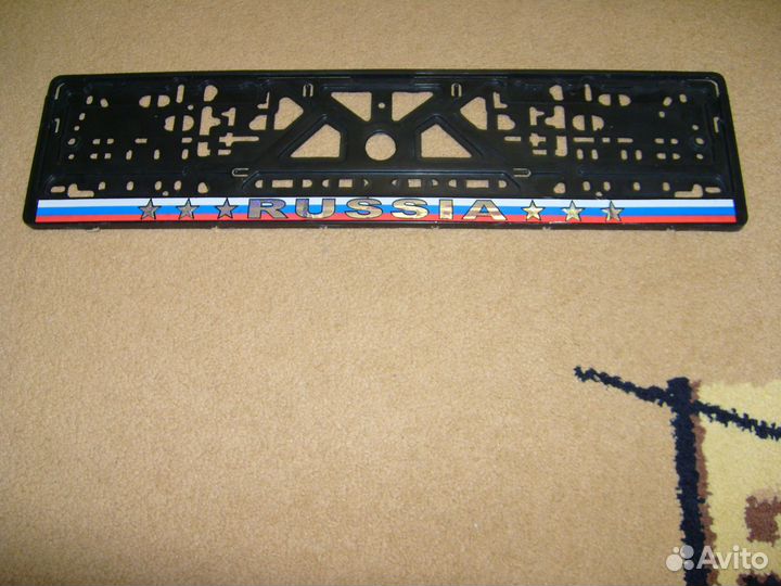 Рамка номерного знака пластмассовая с защёлкой пол