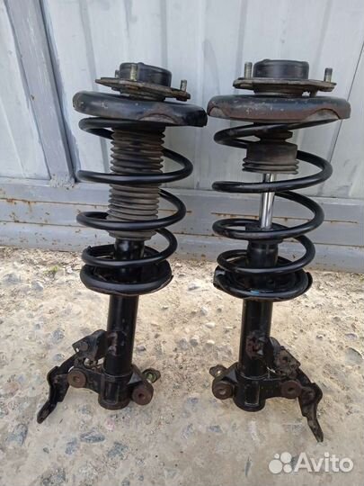 Стойка передняя (пр/лев) Nissan primera p12e YD22