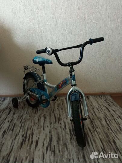 Четырехколесный велосипед