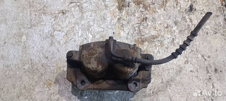 Суппорт передний левый