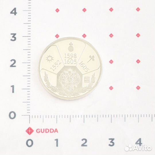 Монета серебряная