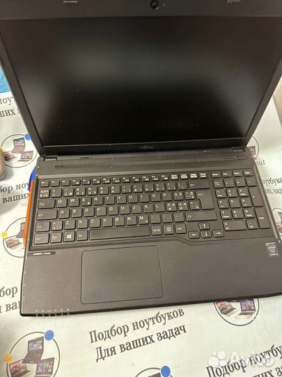 Fujitsu A514 core I3 4005u/4gb ram