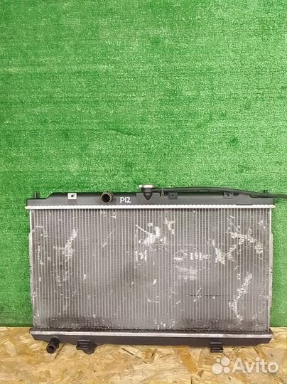 Радиатор охлаждения двигателя Nissan Primera P12