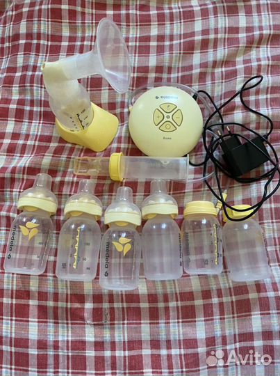 Молокоотсос medela электрический