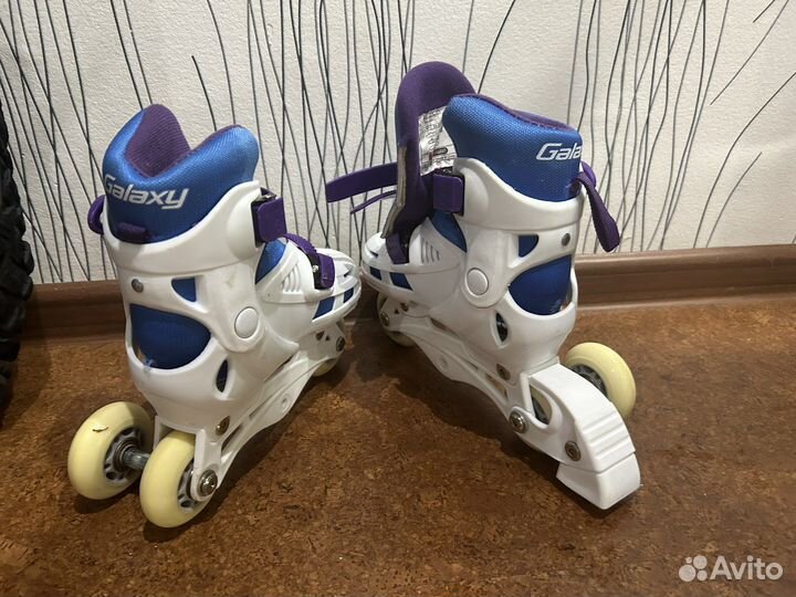 Роликовые коньки