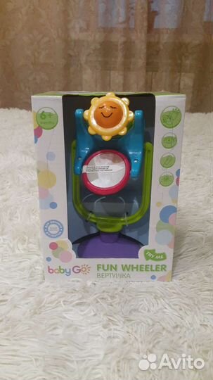 Развиваюшая игрушка вертушка на присоске