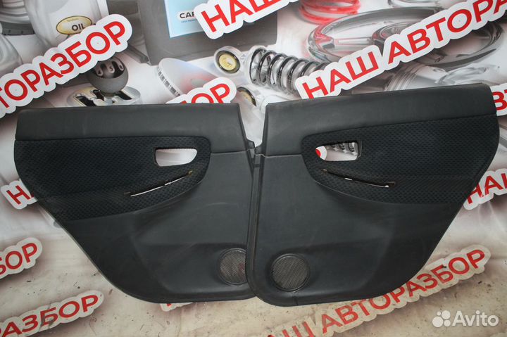 Обшивка двери задняя subaru impreza