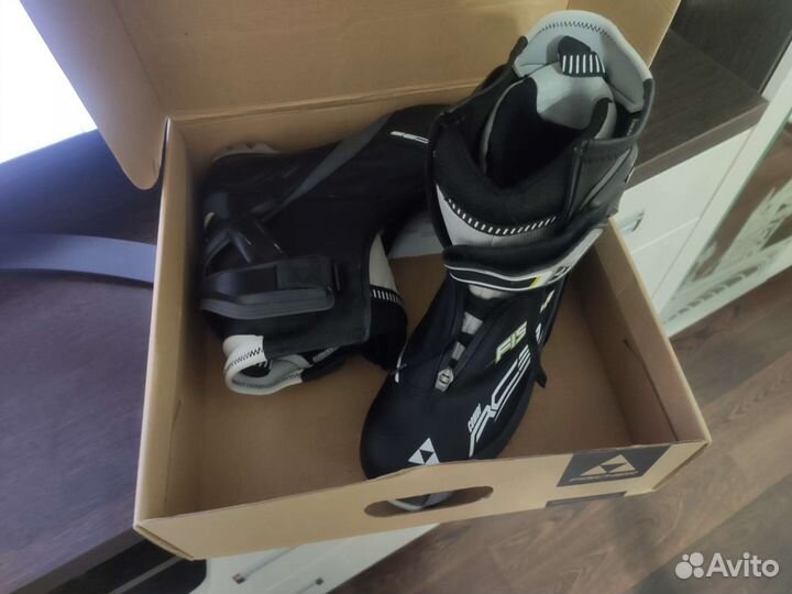 Лыжи и ботинки fisher