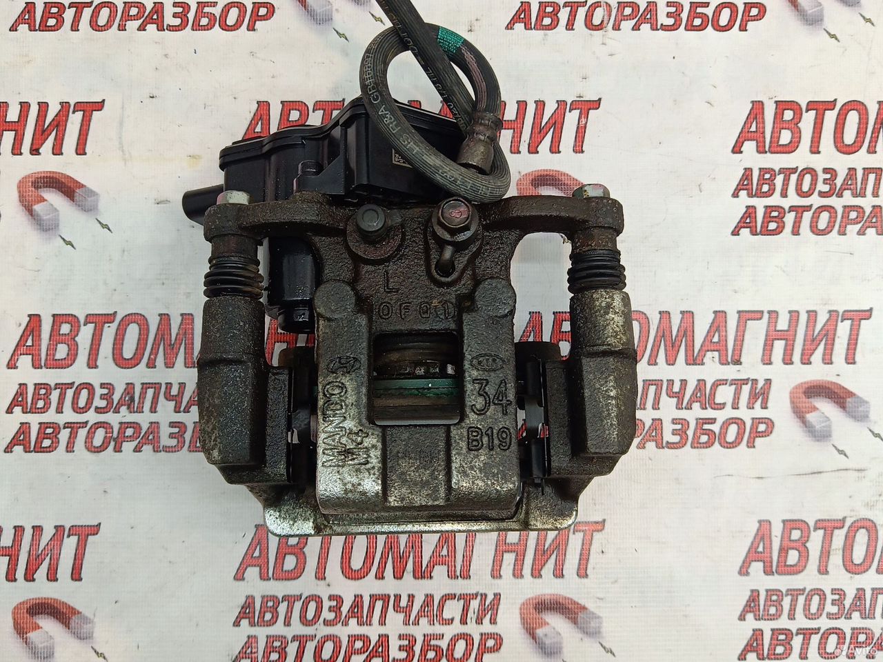 Супорт тормозной задний левый Хендай Элантра 7 CN