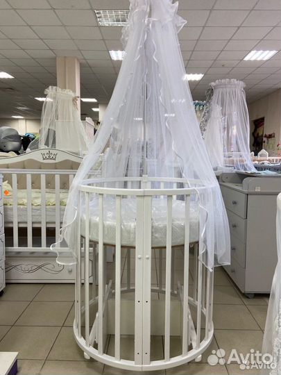 Детская кроватка круглая овальная с маятником