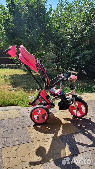 Детский трехколесный велосипед коляска
